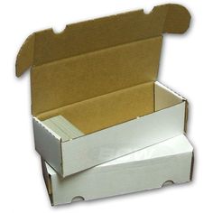 an open box with the lid closed and two boxes stacked on top of each other