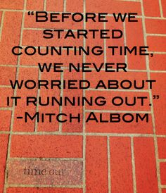 a brick sidewalk with the words before we started counting time, we never worried about it running out - michael