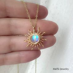 Adjustable Celestial Wire Wrapped Jewelry, Unique Round Jewelry With Sun Design, Unique Round Sun Design Jewelry, Summer Sun Design Jewelry Gift, Sun And Moon Design Jewelry For Summer, Sun And Moon Design Jewelry As Summer Gift, Bohemian Sun-shaped Gold Jewelry, Celestial Wire Wrapped Jewelry For Gifts, Bohemian Sun Shaped Jewelry Gift