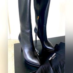 Saint Laurent Paris Black Leather Janis Boots New In Box. Size 40 5” Heel 1” Platform Zippers On Inner Calves Saint Laurent Boot Box Included Pictures Don't Do Justice Smoke Free And Pet Free Always. Luxury High Heel Boots For Work, Luxury Heeled Boots With 4-inch Pointed Toe, Luxury Pointed Toe Heeled Boots With 4-inch Heel, Luxury Heeled Boots With 4-inch Heel And Pointed Toe, Chic Heeled Boots With Leather Lining For Party, Luxury Heeled Boots With 4-inch Heel For Party, Evening Heeled Boots In Calf Leather, Fitted Calf Leather Heeled Boots For Night Out, Designer Fitted Heeled Boots For Office