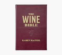 the wine bible by kaleen maciel is shown in red leather with gold lettering