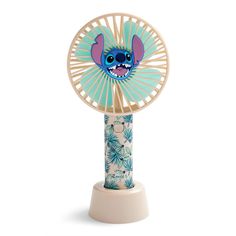 a small fan with an image of stitch on it