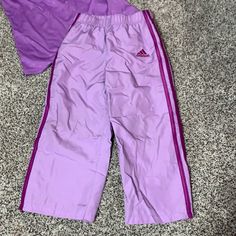 Never Worn ! Cute Adidas Pants For Your Young One! Light Purple Color With Dark Purple Detailing. Stretchy Waist Band! Comes From A Smoke And Pet Free Home!(Top Sold Separately) Try To Ship Same Day, Or Very Next Day! Questions? Feel Free To Comment!! Sporty Spring Bottoms For Playtime, Sporty Spring Playtime Bottoms, Purple Cotton Bottoms For Playtime, Casual Purple Playwear Bottoms, Casual Purple Bottoms For Playwear, Purple Bottoms For Playwear In Spring, Cute Adidas, Adidas Bottoms, Light Purple Color