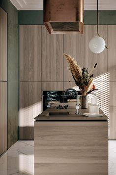 a modern kitchen with wooden cabinets and counter tops