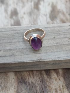 NOTE : WE USED NATURAL GEMSTONES , SO STONE MAY BE LITTLE DIFFERENT .This is a listing of Boho sterling silver ring # metal = sterling silver 925 # Gemstone - Amethyst # Ring Size - Available in all Size # Stone Color - Purple # Stone Shape - Oval Handmade Crafting bohemian Ring - This style has bohemian style . it will look beautiful when you wear it .. Thanks for visiting our shop ... favorite our shop for daily updates ... Bohemian Sterling Silver Ruby Ring, Handmade Oval Amethyst Spiritual Ring, Handmade Bohemian Oval Ruby Ring, Handmade Spiritual Oval Amethyst Ring, Bohemian Handmade Oval Ruby Ring, Handmade Spiritual Amethyst Oval Ring, Handmade Bohemian Amethyst Ring In Sterling Silver, Bohemian Silver Amethyst Ring, Bohemian Amethyst Ring As Gift