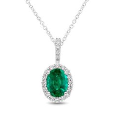 Classic White Gold Emerald Necklace With Diamond Accents, Classic Emerald Pendant Necklace With Diamond Accents, Formal Green Oval Necklace, Exquisite Green Oval Emerald Necklace, Exquisite Oval Green Emerald Necklace, Green Oval Necklace For Formal Occasions, Elegant Oval Emerald Necklace For Formal Occasions, Luxury Oval Necklaces For May Birthstone, Luxury Oval Emerald Necklace