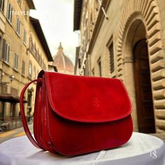 This bag has been made of the best genuine leather by local master crafters of Florence in Italy, designed for women who only accept premium Italian quality and luxury leather bags and modern Italian fashion. . Sizes: Width:   27cm/10.6inch Height:  19 cm/7.5 inch Depth:    10cm/4.72 inch . The story of this bag: In the heart of Florence, Casa di Pelle stands as a testament to fine craftsmanship, housing the Epiphany Bridge Leather Tote Bag, a masterpiece by artisan Giovanni. Sophia, with love i Luxury Red Flap Bag For Daily Use, Designer Leather Flap Bag As Gift, Luxury Leather Flap Bag As Gift, Luxury Leather Flap Bag For Gifts, Luxury Leather Flap Bag Gift, Luxury Red Leather Saddle Bag, Red Leather Saddle Bag Shaped As Satchel, Luxury Formal Vegetable Tanned Leather Shoulder Bag, Classic Red Shoulder Bag As Gift