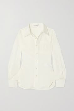 Find SAINT LAURENT Embroidered Cotton And Linen-blend Shirt on Editorialist. It's always worthwhile investing in high-quality shirting, and styles like this one by SAINT LAURENT translate well all year round. From the maison's Pre-Fall '21 collection, it's tailored from cotton and linen-blend for a slightly loose fit and has neat tuxedo-style cuffs. The chest pocket is subtly embroidered with the interlocking logo in tonal threads. Ysl Clothes, Ysl Shirt, Saint Laurent Shirt, Tuxedo Style, Sports Skirts, Luxury Women Fashion, Classic Jeans, Silk Crepe, Pre Fall