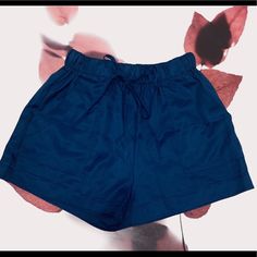 Adorable Comfy High Waist Navy Blue Cinch Shorts! These Are Perfect To Dress Up Or Down! Convenient Pockets And Easy To Adjust Waist Tie These Measure About 14 Inches From Very Top To Bottom In Length! Only Have Medium Left! Navy Drawstring Bottoms Short Length, Navy Drawstring Shorts, Navy Shorts With Elastic Waistband For Spring, Trendy Blue Shorts With Short Inseam, Trendy Blue Shorts With Elastic Waistband, Blue Stretch Shorts For Day Out, Blue Shorts With Elastic Waistband For Day Out, Navy Shorts With Pockets For Spring, Spring Navy Shorts With Pockets