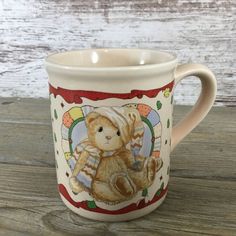 a coffee mug with a cat on it