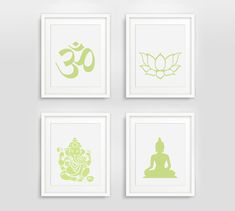 four green and white framed art prints with buddha symbols on them, all in different sizes