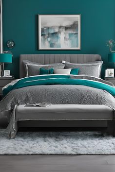 a bedroom with teal walls and grey bedding