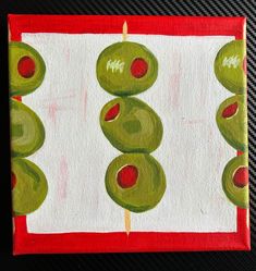 an acrylic painting of green olives on a red and white background