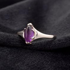 Dive into the magical temptation of this stunning Ring in attractive shape and design made of Sterling Silver studded with Amethyst. An essential ornament to add in your jewelry collection! ----------------------------------- Welcome TO Our Shop TJONILNESHOP ----------------------------------- Dainty Amethyst Ring, Unique Gemstone Ring, Sparkling Purple Ring, 925 Sterling Silver Ring, Handmade Jewelry For Women, Cocktail Ring Idea SKU : TR-2-7 Gemstone : Amethyst Stone Shape : Marquise Metal : S Purple Ring, Purple Rings, Unique Gemstones, Ring Unique, Amethyst Stone, Sterling Silver Studs, Amethyst Ring, Jewelry For Women, Ring Handmade