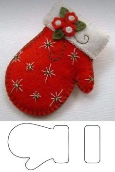 an image of a red mitt ornament with flowers and leaves on it