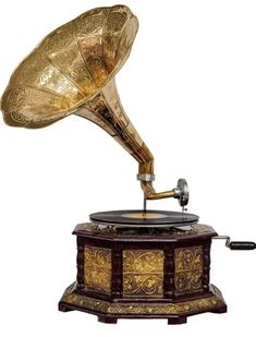 an old fashioned record player with a golden horn