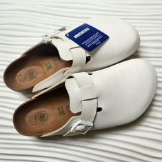 Brand New With Tag Size 10.5- 11 Women Men 8- 8.5 White Clogs With Textured Footbed For Spring, White Spring Clogs With Textured Footbed, Comfortable White Round Toe Mules, White Round Toe Mules With Rubber Sole, White Closed Toe Clogs With Leather Footbed, Outdoor White Clogs With Removable Insole, Casual White Round Toe Mules, White Clogs With Removable Insole And Round Toe, Comfortable White Flat Clogs