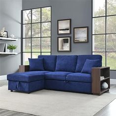 a blue sectional sofa with pull out bed