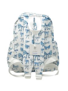 A limited-edition backpack, designed with love. We teamed up with TRVL Design to bring you this exclusive TRVL Design x Danrie Signature Bow Mini Backer. It's the perfect backpack for your littlest littles, featuring two-way top zip, adjustable padded straps, and our custom bow print on an easy-to-wipe (and machine washable!) coated cotton. Snag it while you can. Size: 8.25"L (base) x 11"H x 4.75"D Must Haves For College, Coquette Backpack, Bow Backpack, Cute Backpacks For School, Preppy School Supplies, School Bag Essentials, Monogram Backpack, Tech Backpack, Brown Backpacks