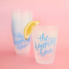 two plastic cups with the words the happy hour and the happiest hour written on them