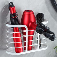 a hair dryer and other items in a holder