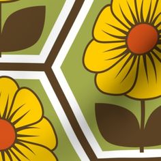 yellow flowers on green and brown hexagonal tiles with red center in the middle