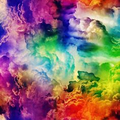 an image of colorful clouds in the sky with rainbow colors on it's side