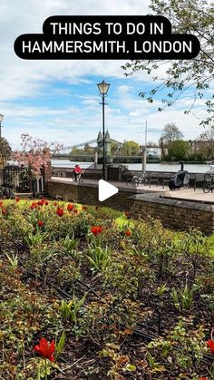 an outdoor area with flowers and plants in the foreground that says things to do in hammersmith, london