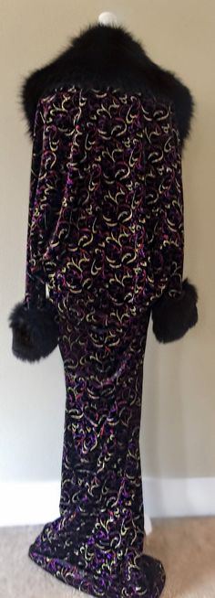 *Available for immediate shipping* Handmade,velvet cocoon robe, faux fur collar and cuffs. Old Hollywood glamour for the modern Diva , this gorgeous robe is made from a beautiful black velvet embossed with glitter pattern and a luxuriant generous midnite black faux fur trim on the collar and cuffs . Hook and eye front closure. For the diva who knows how to make an entrance! Fits up to size 18 and super flattering on all bodies! Fitted Fur Coat With Faux Fur Trim For Party, Fitted Party Fur Coat With Faux Fur Lining, Fitted Black Fur Coat For Party, Fitted Fur Coat With Faux Fur Lining For Party, Elegant Party Fur Coat With Feather Trim, Elegant Party Fur Coat, Elegant Fitted Fur Coat For Party, Elegant Long Sleeve Fur Coat For Party, Party Fur Coat With Faux Fur Trim