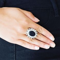 Encrusted In Dainty White Rhinestones, A Frilly Silver Frame Spins Around A Glowing Black Moonstone Center For A Regal Look. Features A Stretchy Band For A Flexible Fit. Elegant Crystal Ring With Bling For Party, Elegant Bling Crystal Ring For Party, Elegant Party Crystal Ring With Bling, Elegant Rhinestone Crystal Ring, Elegant Formal Crystal Ring With Rhinestones, Glamorous Formal Rings With Rhinestones, Glamorous Rhinestone Formal Rings, Elegant Oval Crystal Ring For Parties, Elegant Crystal Ring With Stones For Formal Occasions