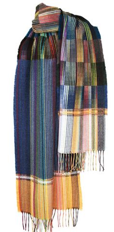 two multicolored scarves with fringes on each side and one has a white background