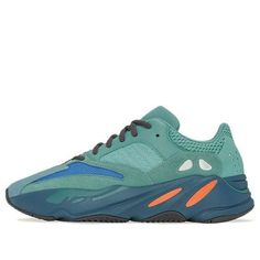 The Adidas Yeezy Boost 700 ‘Faded Azure’ is a vibrant take on the retro-inspired silhouette. A turquoise hue floods most of the upper, crafted from mesh, suede and leather, with blue and tan mesh inserts atop the box. The monochromatic design is broken up by reflective details, while responsive cushioning arrives via a Boost midsole. The herringbone-traction rubber outsole completes the look. (SNKR/Unisex/Low Top/Dad Shoes/Wear-resistant) Dad Shoe, Monochromatic Design, Yeezy 700, Dad Shoes, Yeezy Boost, Adidas Yeezy, Adidas Yeezy Boost, Retro Inspired, Herringbone