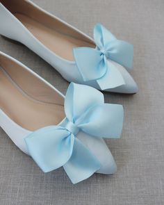 "Chic satin pointy toe flats with oversized satin bow. Perfect simplicity for bride and wedding party. DETAILS: COLORS AVAILABLE: White, Off White, Ivory, Pink, Dusty Pink, Champagne, Aqua Blue, Light Blue and Royal Blue Satin. UPPER: Synthetic upper and lining MATERIALS: Mandmade outsole STYLE NAME: VANITA SIZE FIT: RUNS LARGE, ORDER 1/2 SIZE SMALLER FROM NORMAL SIZE Not sure of which size to purchase? Shoes measurements are as follow: (Please note measurements taken the length of inside of sho Flat Wedding Shoes For Prom In Spring, Elegant Blue Ballet Flats, Spring Flat Wedding Shoes, Elegant Blue Evening Flats, Elegant Blue Closed Toe Ballet Flats, Blue Pointed Toe Ballet Flats, Blue Flats For Evening With Flat Heel, Wedding Flats With Bow Detail, Elegant Wedding Ballet Flats With Satin Bow