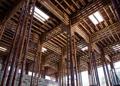 the inside of a building made out of wooden planks