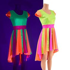 This tri color dress is made from our neon pink, orange, and lime holographic fabrics.Cap sleeves, a scoop neckline, darted bodice, banded waist, and full circle cut hi-lo hemline.Want a different color combo?  Please ask!Womens Sizing (See below for instructions on where measurements should be taken)XXS: Bust 29"-30" / Waist 22"-23" / Hips 30"-32"Extra Small: Bust 31"-32" / Waist 24"-25" / Hips 33"-35"Small: Bust 33"-34" / Waist 26"-28" / Hips 36"-37"Medium: Bust 35"-37" /Waist 28"-31" / Hips 3 Stretch Disco Dress For Summer, Spring Fiesta Green Dress, Party Dresses With Color Block And Stretch Fit, Pink Disco Dresses For Summer, Color Block Stretch Dress For Party, Neon Summer Party Dress, Green Summer Dress For Fiesta, Stretch Color Block Party Dresses, Green Spring Fiesta Dress