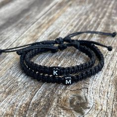 "These lovely bracelets are made with 1.5mm waterproof cord.  The \"Adult\" bracelet closes to around 6.5\". The \"Kid\" bracelet will fit a 5\" wrist. Both bracelets have an adjustable closure. To receive the Mommy and Me set, choose the \"1 Adult 1 Kid\" option. Please feel free to contact me if you have any question." Personalized Black Braided Bracelet For Everyday, Black Personalized Braided Bracelet For Everyday, Black Adjustable Cord Friendship Bracelets, Black Adjustable Cord Friendship Bracelet For Everyday, Black Adjustable Cord Friendship Bracelet, Casual Adjustable Hypoallergenic Friendship Bracelets, Everyday Black Nylon Cord Friendship Bracelets, Black Friendship Bracelets With Sliding Knot, Personalized Adjustable Black Bracelets