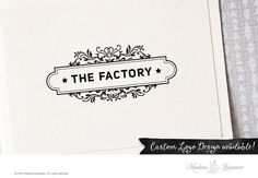 the factory logo is shown on top of a piece of paper with an ornate border