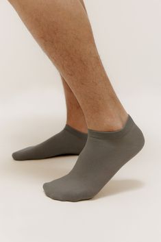 Ultra low profile and super comfortable, these ankle socks are an everyday essential perfect for low-cut footwear. This convenient value pack is great as a practical gift or for restocking your own sock drawer. P.S. They're a great unisex sock option! Details Materials & Care Shipping & Returns • Ankle-length low-cut men's socks in a total of six easy-to-match colors. Each pack includes three pairs of socks in three colors.• Made from a breathable cotton blend with added Spandex for flexibility. Casual Gray Sports Socks, Comfortable No-show Casual Socks, Casual Gray Breathable Socks, Casual Stretch Slip-resistant Socks, Casual Slip-resistant Stretch Socks, Comfortable Lightweight Gray Socks, Casual Slip-resistant Gray Socks, Casual Gray Slip-resistant Socks, Casual Non-slip Gray Socks