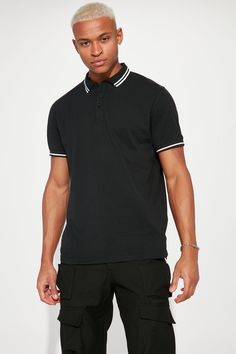 Model Height: 6'2 - Wearing Large Big & Tall: Height 6'5 - Wearing XXL Available In Black, White, Grey, Pink, Red, Navy, Neon Pink, Neon Yellow, Green, Yellow, Light Blue, and Coral Fold Down Collar 3 Button Closure Short Sleeve 100% Cotton Imported | Mens Wilson Short Sleeve Polo in Black size 2XL by Fashion Nova Black Collared Cotton Polo Shirt, Black Cotton Collared Polo Shirt, Black Relaxed Fit Polo Shirt, Relaxed Fit Black Polo Shirt, Black Relaxed Fit Casual Polo Shirt, Casual Black Relaxed Fit Polo Shirt, Black Relaxed Fit Shirt With Collared Neckline, Casual Black Shirt With Collared Neckline, Casual Black Collared Shirt