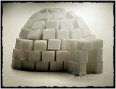 a pile of sugar cubes sitting on top of each other