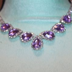 Nwt: Clear & Lavender Rhinestones In A Teardrop Design, The Clear Surround The Teardrop Designs, 16" + 2" Long, This Is A Very Pretty Brides Necklace Silver Teardrop Crystal Rhinestone Necklace, Silver Teardrop Rhinestone Necklace, Elegant Purple Crystal Rhinestone Necklace, Elegant Purple Rhinestone Crystal Necklace, Purple Rhinestone Jewelry For Anniversary, Purple Rhinestones Jewelry For Anniversary, Elegant Purple Rhinestone Necklace For Party, Purple Rhinestone Necklace For Wedding, Purple Rhinestone Wedding Necklace