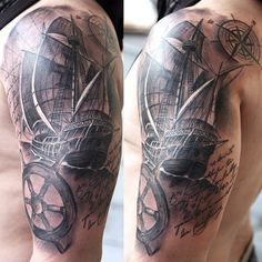 a man's half sleeve with a ship and compass tattoo on his left arm