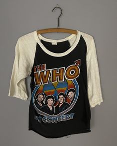 "'The WHO' rare vintage concert raglan T-shirt, baseball sleeve souvenir shirt soft VERY RARE, distressed trashed worn in 70s vintage. 3/4 sleeve. There are many imperfections, minor tears, holes, color fading and stains distressed graphic, worn in and soft fabric. (see photos) Be sure you are looking for a trashed and thrashed...worn and torn vintage piece! TAG SIZE: Large (*FITS LIKE A SMALL, PLEASE SEE MEASUREMENTS) MATERIAL: 100 cotton (very worn in) MEASUREMENTS LAYING FLAT in INCHES: SHOUL Neon Tank Top, Souvenir Shirt, Retro Tee, The Who, 70s Vintage, Vintage Harley, Baseball Shirts, Cropped Tank Top, Vintage Tees