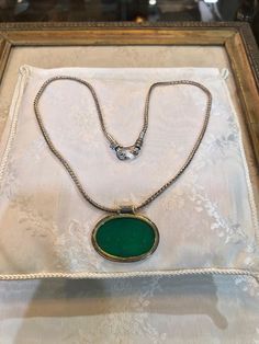 This stunning medallion is a timeless piece of jewelry crafted with a combination of gold and silver and a dazzling green agate seal stone. Handmade for an authentic Vintage look, this medallion is inspired by Greek Jewelry and will add an elegant touch to any outfit. Evil Eye Stone, A Seal, Greek Jewelry, Green Agate, Fine Jewelry Collection, Pendant Rings, Handmade Pendant, Handmade Pendants, Jewelry Handmade