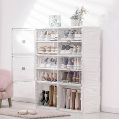 a white shoe rack filled with lots of shoes