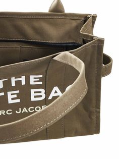 •Top zip fastening•Double top handle•Contrasting namesake branding at front•Interior: one main compartment, one zip pocket, two slip pockets•Back patch with lettering and logo•Textural cotton canvas design•Green color•100% Cotton•Made in Extra EU410x330x150x530mmSize Type: UniqueGender: WomenMaterial: NATURAL (VEG)->COTTON100 %Color: SLATE GREENMade in: VNProduct ID: M0016156-372*Import tax/duty will be calculated at checkout (If applicable) Canvas Double Handle Shoulder Bag With Logo Print, Everyday Top Handle Bags With Logo Print, Functional Logo Print Bag, Cotton Double Handle Bag With Logo Print, Functional Bags With Logo Print, Functional Everyday Bags With Logo Print, Everyday Double Handle Bag With Logo Print, Brown Bags With Logo Hardware For Everyday Use, Everyday Brown Bags With Logo Hardware