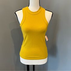 New With Tags. Size X-Small Dimensions Of Mannequin For Reference: Bust 34 1/2” Shoulder 15 3/3” Waist 25 1/2” Hips 34” Yellow Stretch Racerback Top, Free People Movement, Racerback Tank, Free People Tops, Free People, Womens Tops, Tank Tops, Tags, Women Shopping