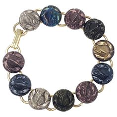 An elegant vintage bracelet, featuring metallic rose links in violet, azure blue, silver, forest green, and iridescent colors. Gold-tone finish. Retro Bracelet, Rose Vintage, Rose Wallpaper, Azure Blue, Vintage Bracelets, Link Bracelets, Rose Flower, Vintage Stil, Vintage Gold