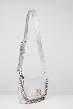 This bag from Balenciaga's Spring/Summer 2024 collection is in a silver peach calfskin with silver hardware. Balenciaga Spring, Laquan Smith, Charlotte Chesnais, Craig Green, Scarf Shirt, Shirts For Leggings, Rick Owens Drkshdw, Cape Coat, Marine Serre