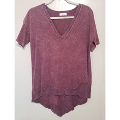 Vintage Burgundy V-Neck Tshirt 100% Cotton Long Enough To Go With Leggings. *Brand New Available Sizes S-L (Picture Is A Small) Sml: 33' Length; 19 1/2" Pit Med: 34" Length; 20 1/2" Pit Lg: 35" Length; 21 1/2" Pit Vintage V-neck Top With Relaxed Fit, Summer V-neck Washed Tops, Burgundy V-neck Top For Summer, Summer Burgundy V-neck Top, Burgundy V-neck Summer Top, Short Sleeve Burgundy Tops For Summer, Burgundy Short Sleeve Tops For Summer, Burgundy Short Sleeve Tops For Spring, Burgundy Casual Short Sleeve Top